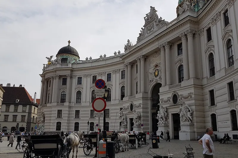 Fiaker carriages waiting on Michaelerplatz outside the St Michael’s Wing