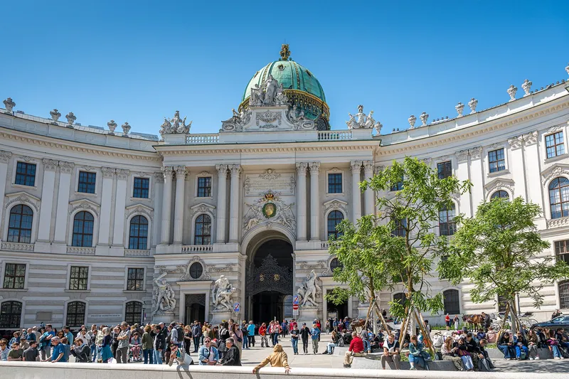 Michaelerplatz front with the green dome on a busy summer day