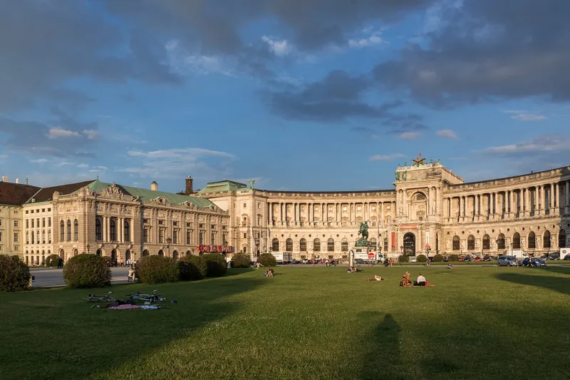 Evening light on the Neue Burg seen from the Volksgarten lawns